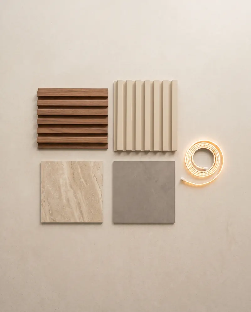 Samples of fluted panels, marble-look and stone-look sheets and a warm LED strip
